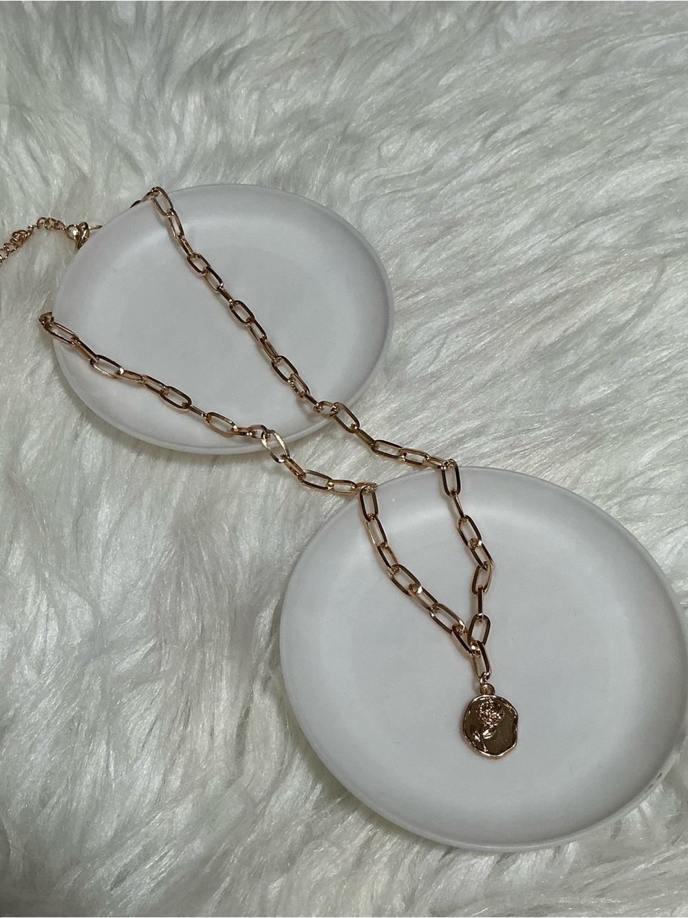 Pretty gold-tone chain necklace with round rose pendant charm